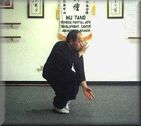 Photo of Master Wong demonstrating Baji
